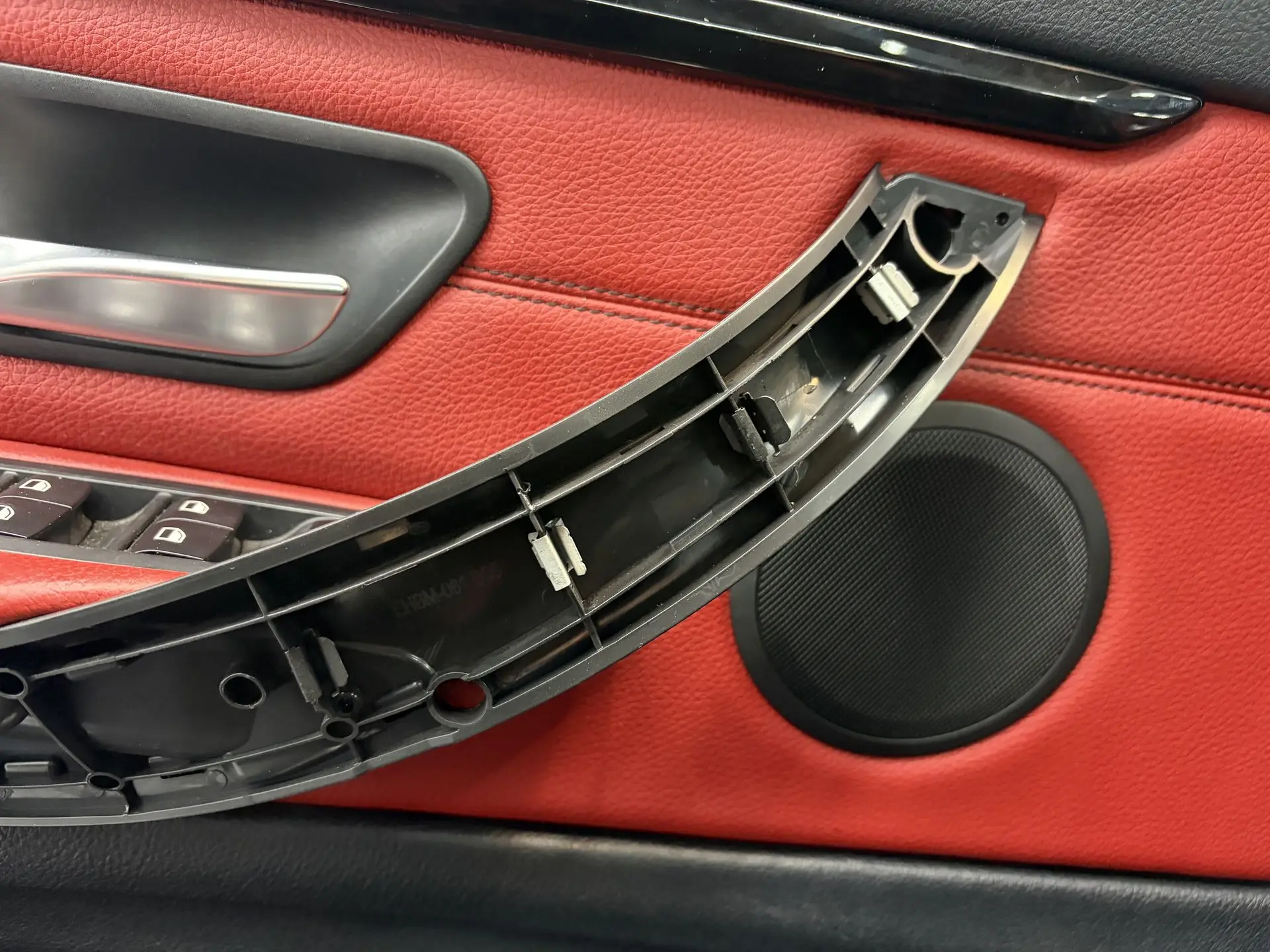 New BMW door handle fixed with self-tapping screws and body washers